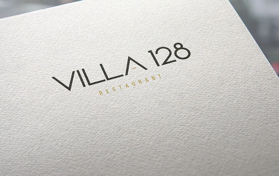 Logo du restaurant Villa 128 imprimé sur papier texturé