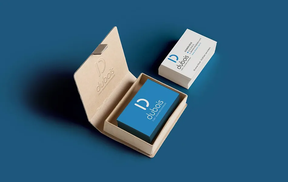 Cartes de visite Dubois bleues dans leur boîte en carton kraft