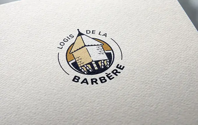 Logo du Logis de la Barbère, échauguette dessinée dans un cercle
